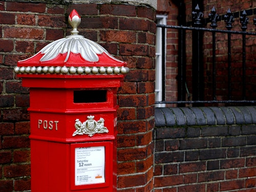 A traditional red British postbox