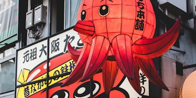 A paper-lantern octopus on a high street