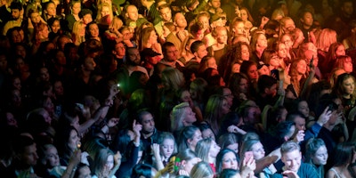 A crowd of fans at a concert