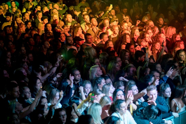 A crowd of fans at a concert