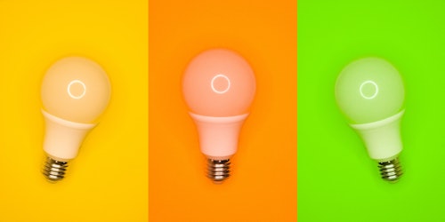Three lightbulbs, in different colors