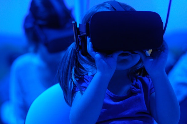 A baby using a VR headset