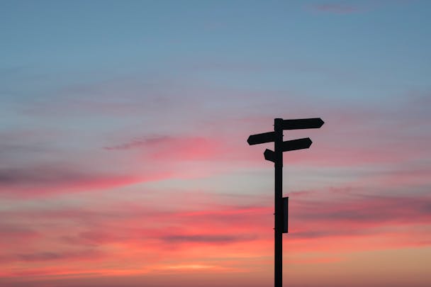 A signpost at a crossroads A signpost at a crossroads