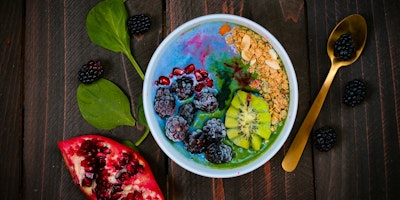 A deliciously colorful bowl of fruits and berries