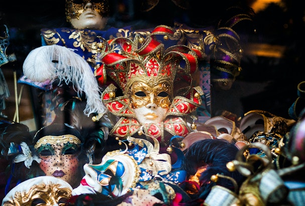 A pile of fancy masks, of the kind associated with Venetian balls