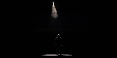 A person in a spotlight