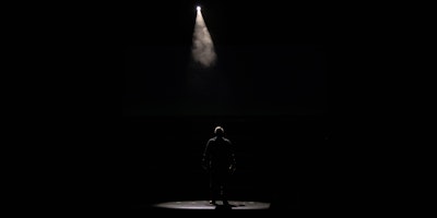 A person in a spotlight