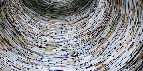 The inside of a cylindrical pile of books