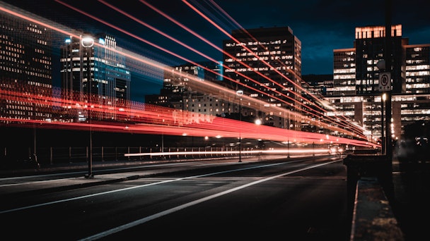 A blur of lights suggesting fast traffic