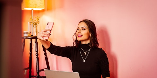 An influencer taking a selfie