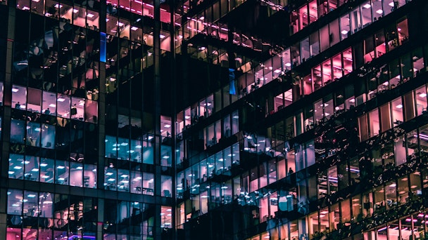 A lit up office building