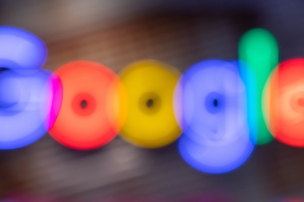 The Google logo, zoomed in and blurry