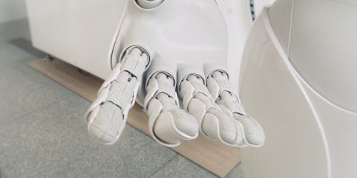 A robot hand reaching out A robot hand reaching out
