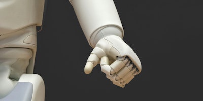 A robot's hand, bunched into a fist