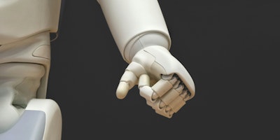 A robot's hand, bunched into a fist