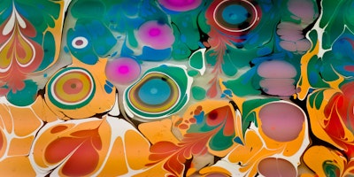 Swirls of colourful paint in a kaleidoscopic pattern