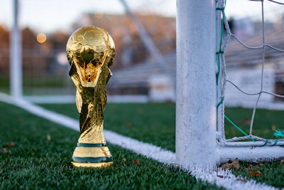 The Fifa World Cup in front of a soccer goal