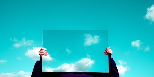 A mirror against a blue sky