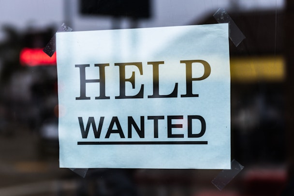 A sign saying "help wanted"