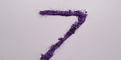 A purple, glittery Z, made from make-up
