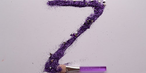A purple, glittery Z, made from make-up