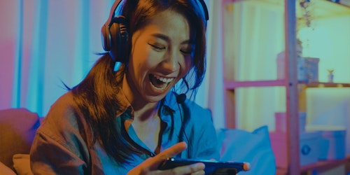 A woman gamer playing video games