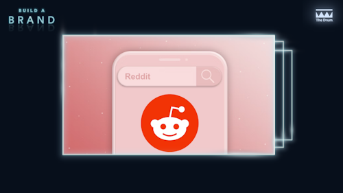 Reddit logo on pink backdrop 