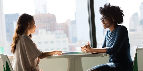 Two women chatting Two women chatting