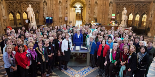 Theresa May poses with parliament's female MPs