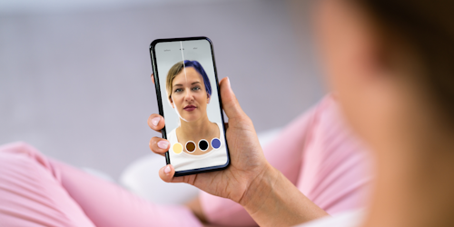 a woman uses an AR beauty filter