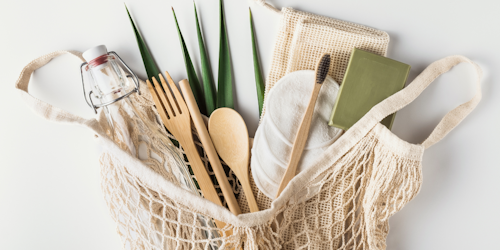 sustainable shopping supplies: reusable straw, wooden utensils, etc.