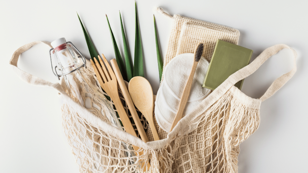 sustainable shopping supplies: reusable straw, wooden utensils, etc.