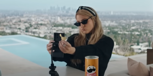meghan trainor with a can of pringles