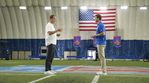 peyton and eli manning on a football field