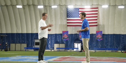 peyton and eli manning on a football field