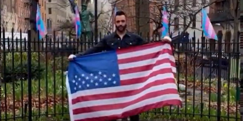man holding a flag