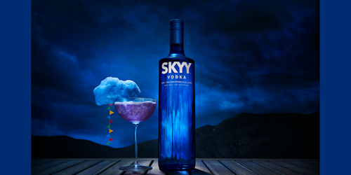 skyy vodka cocktail in front of stormy skies