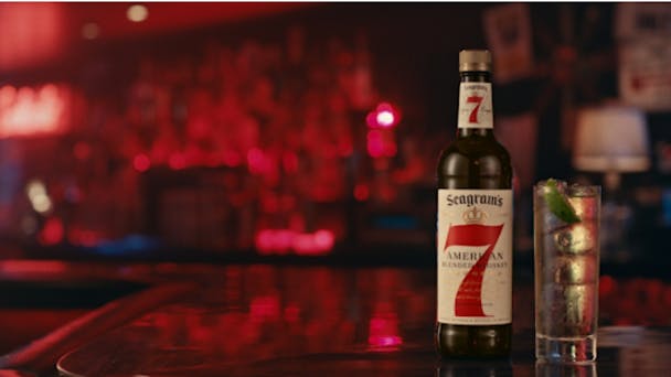 bottle of seagram's 7 whiskey at a bar bottle of seagram's 7 whiskey at a bar