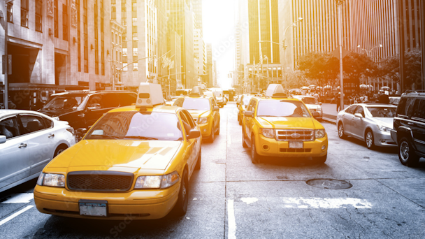 taxi cabs on a street in new york city