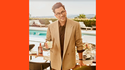dan levy with a cocktail