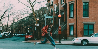 Guy running on street