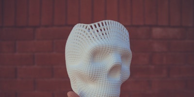 White 3D printed skull scale model image