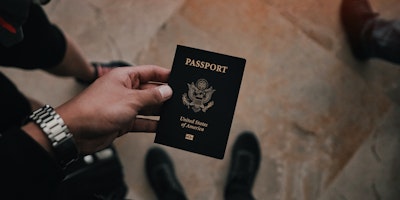 Person holding a passport