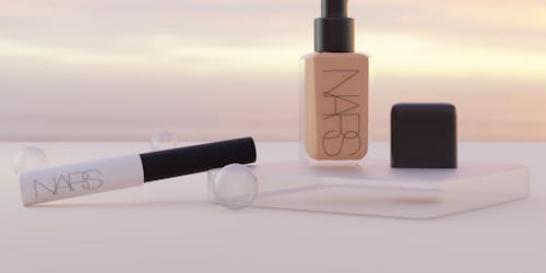 Nars cosmetic products against dreamy backdrop, created in Blender