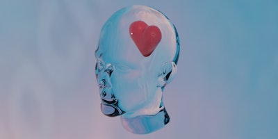 3D render of glass head with red heart inside