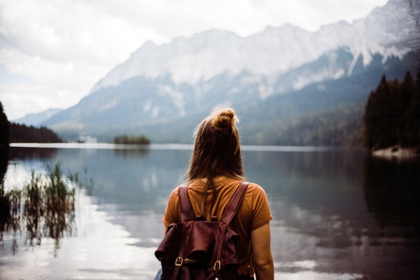 Girl looking out across a body of water
