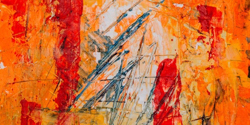 Orange and red abstract painting up close
