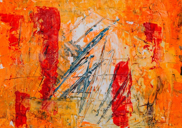 Orange and red abstract painting up close
