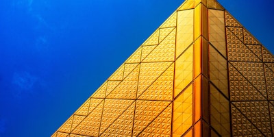 Gold building under blue sky - Tokyo Big Sight East Exhibition Hall, Kōtō-ku, Japan