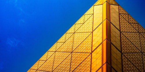 Gold building under blue sky - Tokyo Big Sight East Exhibition Hall, Kōtō-ku, Japan
